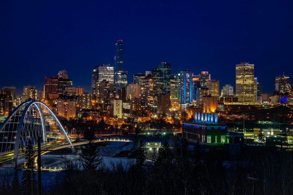 Edmonton skyline at sunset with residential homes – Free Online Home Value Report Alberta by HouseValueReport.ca